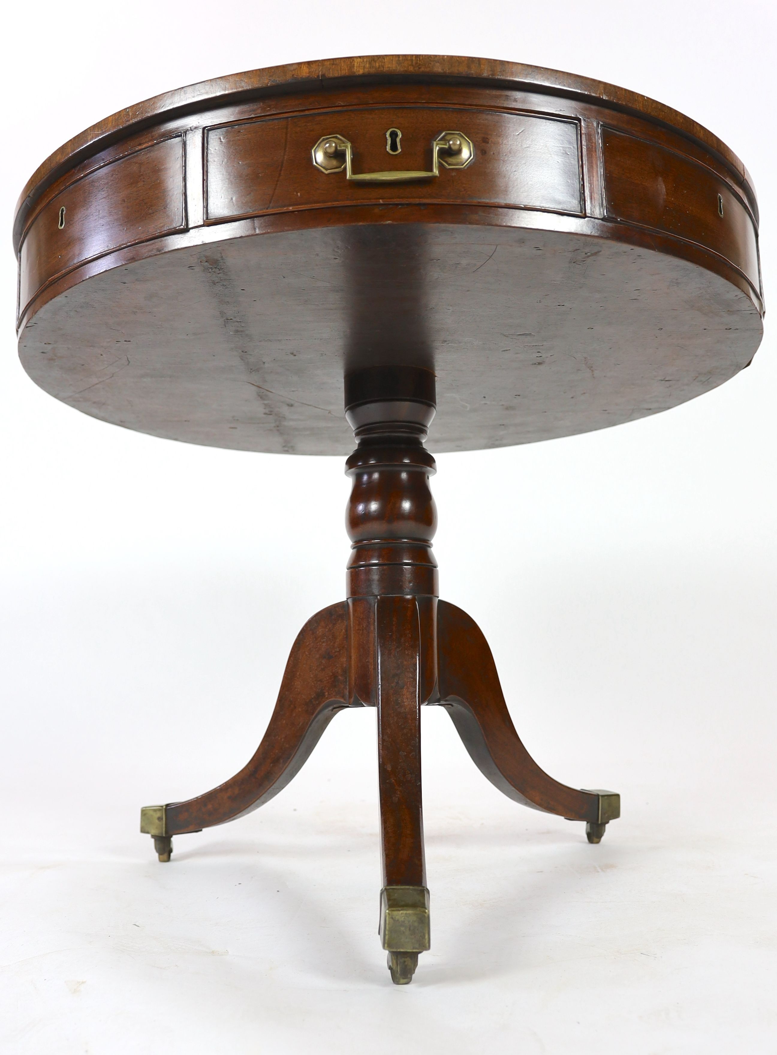 A George III mahogany drum top table, diameter 86cm H.74cm